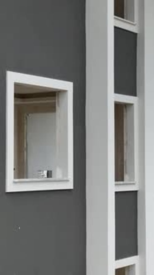 Vertical Video Completing Houses Window Installation and Facade Elements in Focus