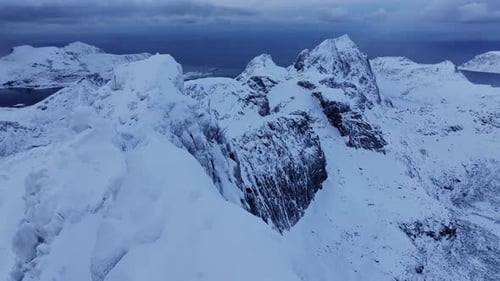 High Mountain Rocky Peaks Draped in White Snow Present a Breathtaking Bird'seye View The Winter