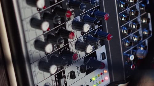 Vertical Video Close Up Shot of Professional Analog Mixer Able to Produce Impeccable Sound