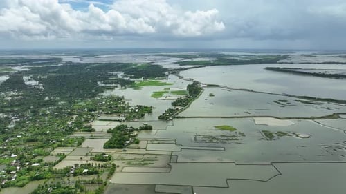 Severe flooding, submerged homes, roads, agricultural fields, Satkhira coastal region, Bangladesh