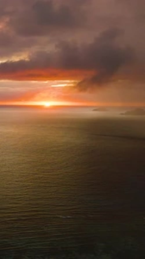 Sunset Light Fading Over the Calm Ocean