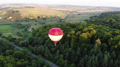 Aerial View of Hot Air Balloon Flying Over the Countryside Landscape Tourist Attraction Balloon Fest