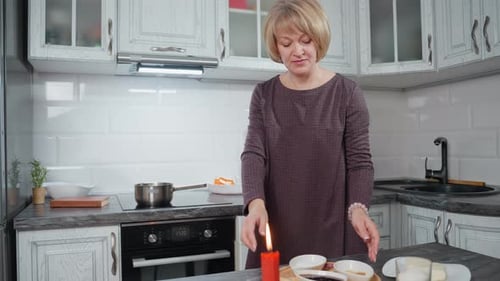 Woman Cooking in Bright Modern Kitchen