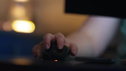 Woman Working Online at Home on the Computer Freelancing Female Hand Working on a Mouse and Answer