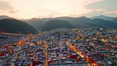 Aerial view of district Old Town containing lots of small residential houses with red tile roofs dur