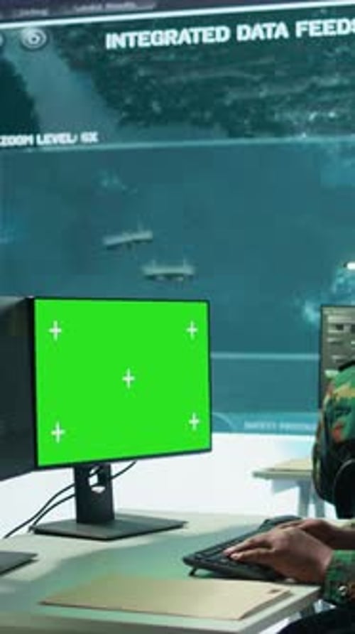 Vertical Video Military Specialist Monitors Satellite Data Next to Green Screen Display