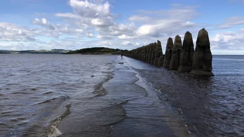 Tide returning to Crammond Island and covering the path with water, Edinburgh, Scotland