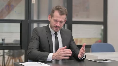 Frustrated Business Man in Office