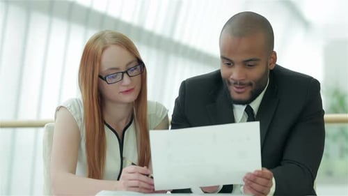 Young People Talking in Office
