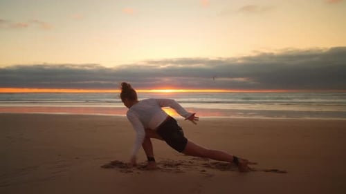 Yoga Exercises Ocean View on Sunset
