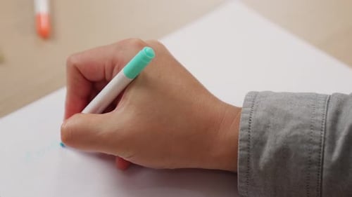 Slow motion hand closeup startup employee making mind map. Variegated