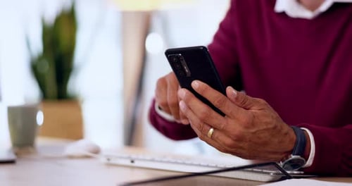 Hands, man typing on smartphone in office and closeup
