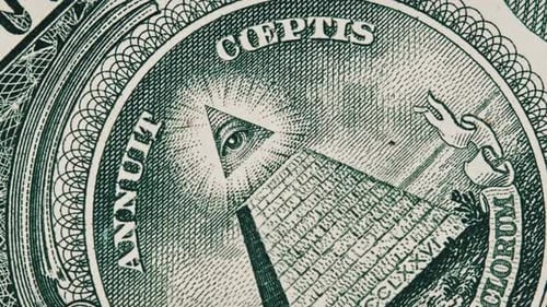 The AllSeeing Eye Sign Rotates on a One Dollar Bill CloseUp