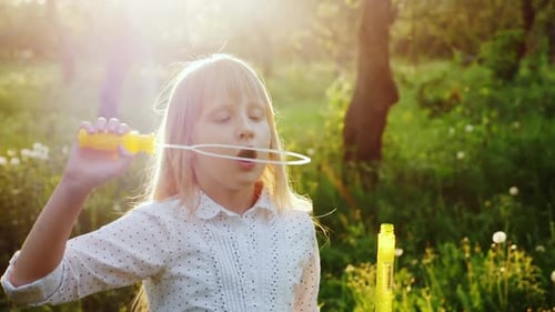 A Carefree Girl Plays with Soap Bubbles Warm Spring Day Slow Motionvideo