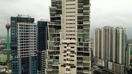 Aerial View of Modern Residential Towers with Green Rooftop Gardens Blends Urban Living with