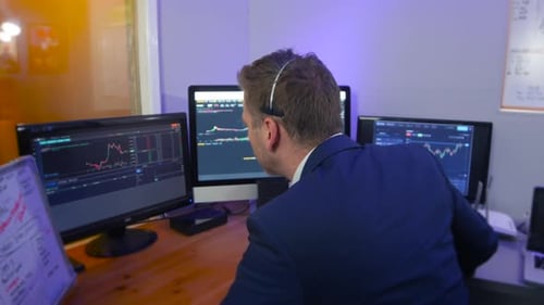 Forex cryptocurrency trader analyst broker checking the trading graphs and signals on stock market s