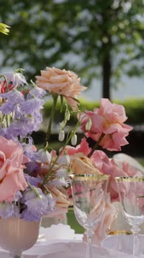 Table Setting at Outdoor Wedding with Roses