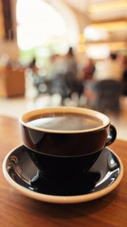 Freshly Brewed Coffee CloseUp in a Cozy Caf