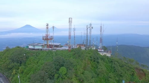 Aerial view of Antenna towers are built on mountain tops for signal transmission. The peak of Mount