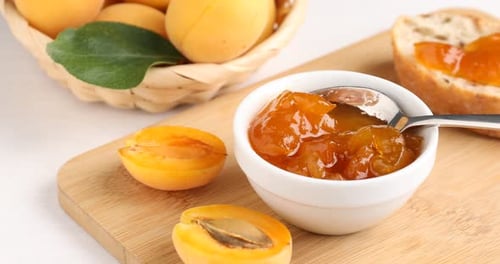 Apricot Jam Still Life on a Wooden Board