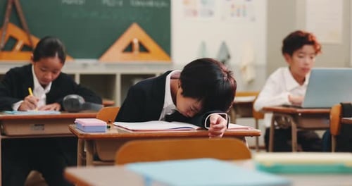Group, child and classroom with sleeping, tired and desk for education, growth or development