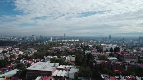 LANDSCAPE OF A CITY WITH A DRONE THE BLUE SKY AND WITH CLOUDS