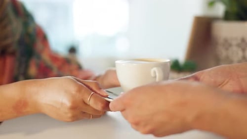 Coffee shop, service and hands of barista and woman to serve customer, client