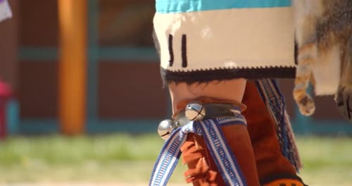 Authentic native american dancers perform traditional dance at taos pueblo New Mexico