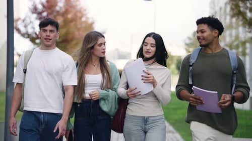 Diverse Group of College Students Walking Together on Campus