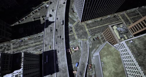 City Intersection with Busy Roads and Tall Buildings During Daylight