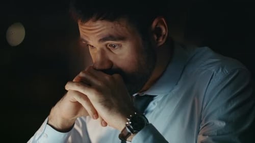 Desperate Business Man Sitting Office Worried Feeling Stress at Night Close Up