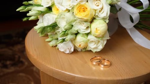 Wedding Bouquet and Rings Symbolize Love