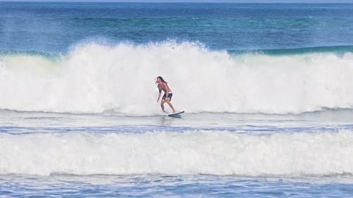 One Surfer Riding on Surf in Beautiful Ocean Waves Slow Motion