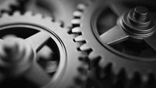 Close-up of Interlocking Metal Gears in Black and White
