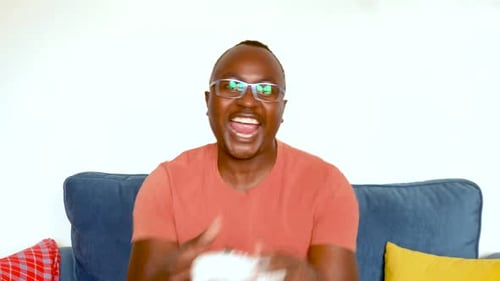 Man Playing Video Games at Home