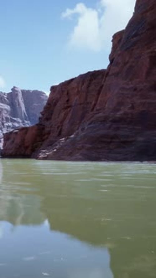 A Serene Mountain Lake Surrounded By Rocky Peaks