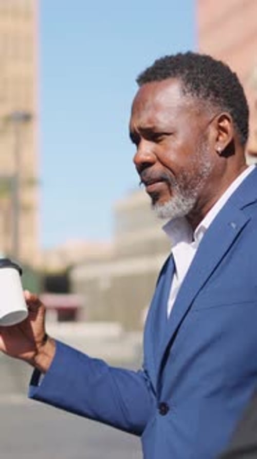 Business People Talking on a City Street