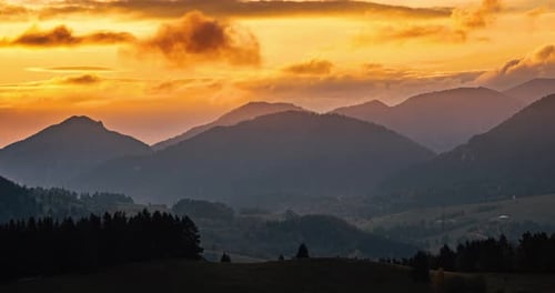 Majestic Mountains at Sunset with Golden Light
