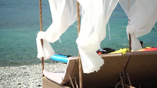Bungalows Sea Beach Lounge Bed with White Silky Curtains Lounge Bed with Canopy at Seaside Beach