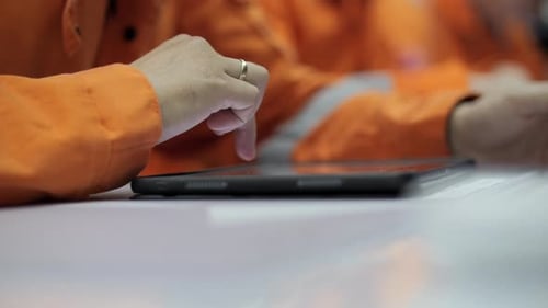 Worker Using Tablet During Digital Training