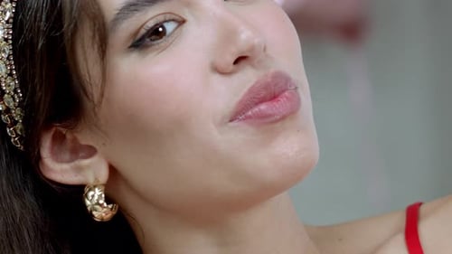 Glamorous Woman Posing with Lace Gloves and Jewelry