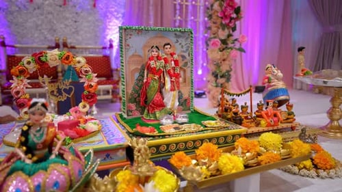 Colorful Indian Wedding Stage Decoration with Traditional Dolls Flowers and Ceremonial Setup Close