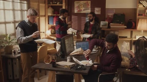 Young Adults Eating Lunch Together in an Office