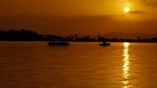 Boats at Sea During Golden Sunset