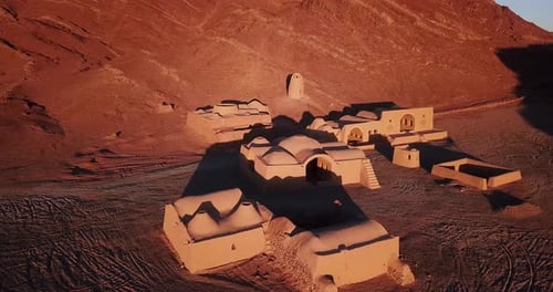 Old Mudbrick Adobe Buildings Close to the Cemetery in Yazd in Iran Middle East in Asia Sunset Time i