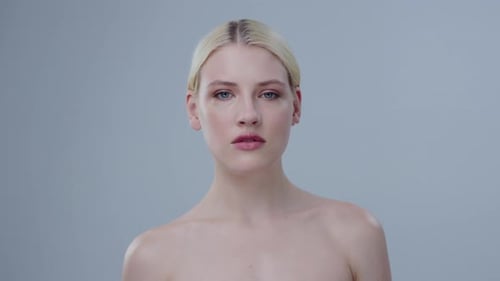 Beautiful Woman with Bare Shoulders Posing