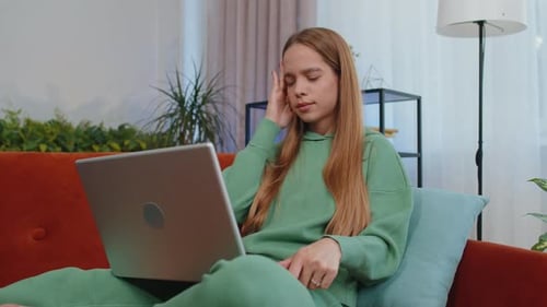 Tired Child Girl Freelancer Use Laptop Suffering From Headache Problem Tension and Migraine Stres