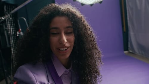 POV of Young Biracial Model Recording Vlog in Professional Photo Studio