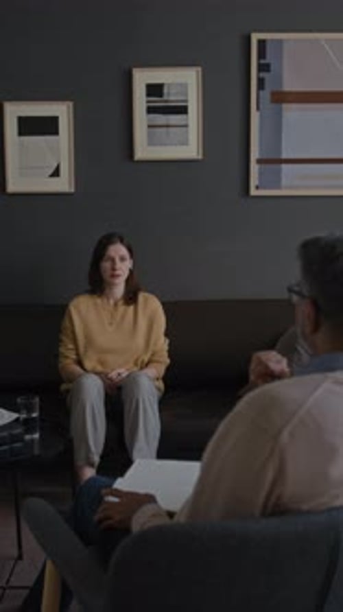 Young Woman Speaking in Therapy Session