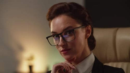 Corporate Woman Smiling with Hand to Chin